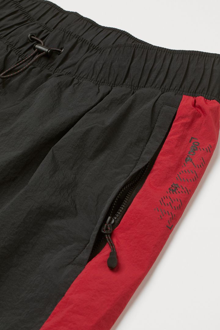 Red best sale nylon pants