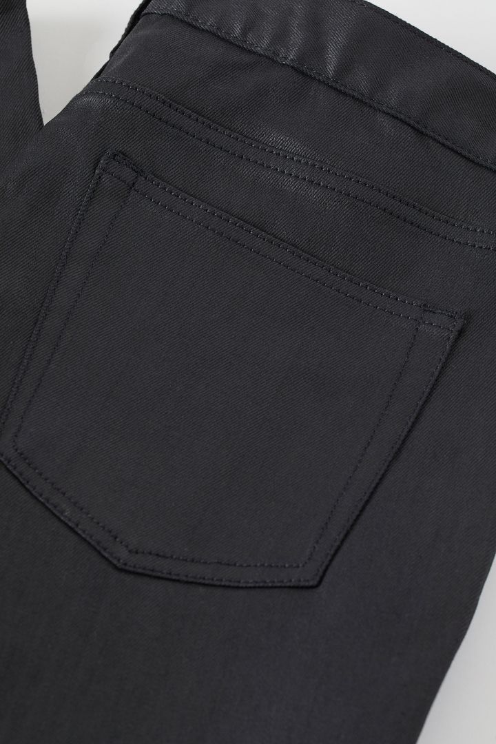 h&m black coated jeans