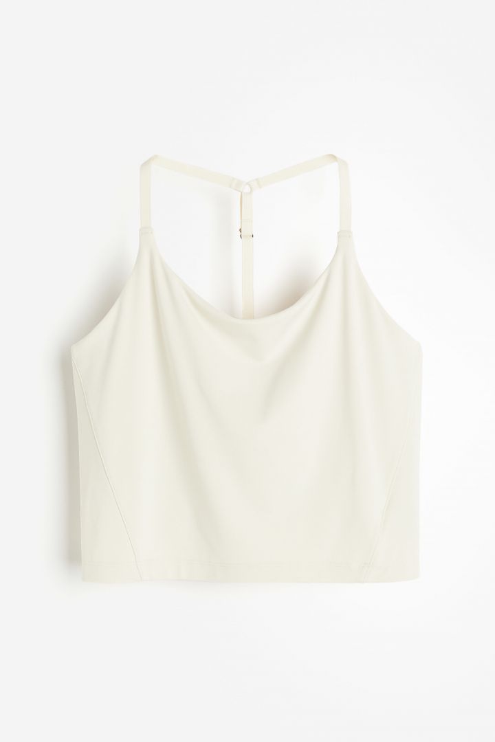 Buy H&M SoftMove™ Cropped sports top 2024 Online